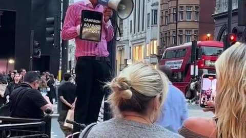 Man protests against stupid people in London.