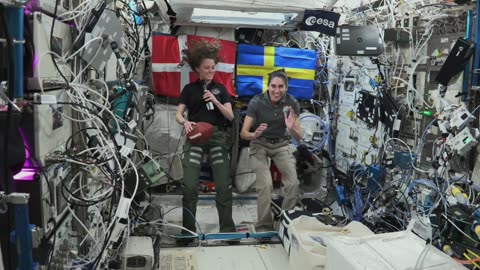 NASA Astronauts Aboard Space Station Huddle Up for Super Bowl