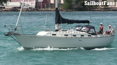 Ripple Sailboat Cruising Down St Clair River In Great Lakes