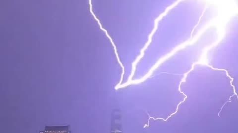 The world trade center being struck by lightning during a strom over a New York City ⚡