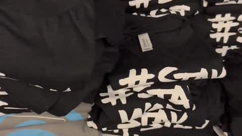 Elon Musk shows a closet full of #StayWoke t-shirts found at Twitter HQ