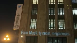 Anti Elon Musk Messages projected onto Twitter's San Francisco headquarters