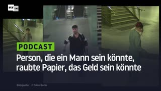 Person, die ein Mann sein könnte, raubte Papier, das Geld sein könnte