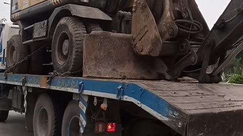 Excavator loaded on truck...https://www.febspot.com/ref/425062