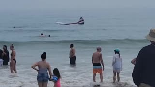 Small plane crashes Into surf at New Hampshire's Hampton Beach