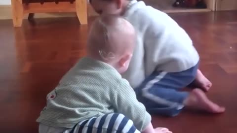 Brothers Laugh While Throwing Spoon