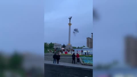Crowd cheering as drone shot down over central Kyiv AFP