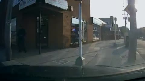 Car Almost Hits Post As Vehicle Takes the Wrong Turn To Switch Lanes In Front Of Them