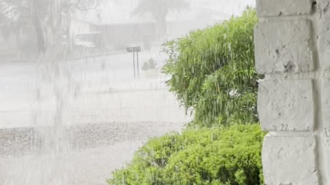 River Pours From Roof During Monsoon Rain