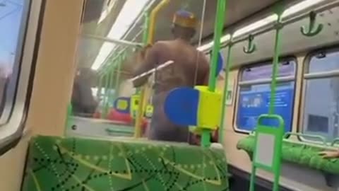 Fed-up Aussie passenger kicks naked African man off a Melbourne tram