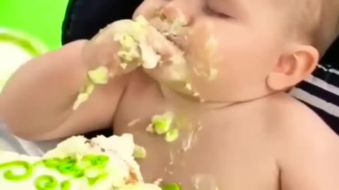 Cute baby eating Pastry