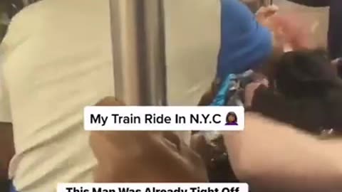 Crazy racist black dude slaps white woman on NYC subway, no one cares