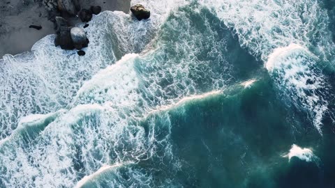 Drone View Of Big Waves Rushing To The Shore