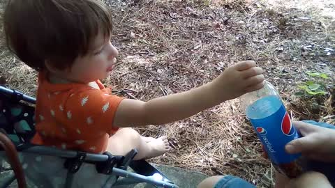 Pepsi baby; baby's first reaction to a lifetime of Pepsi