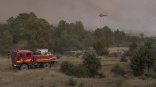 Firefighters Battle Wildfires in Spain