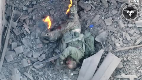 Russian soldier hiding in a destroyed house gets hit and set on fire by an FPV