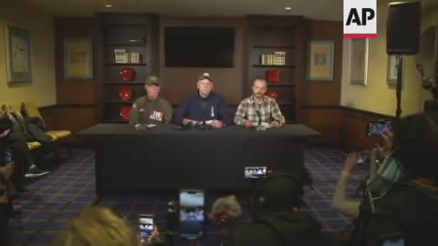 Truck protesters in Ottawa conduct a press conference.