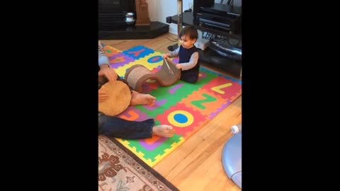 Cute toddler dances to drum