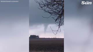 Fierce funnel cloud twister looms over central Illinois during huge storm