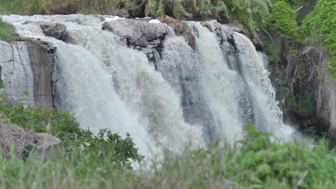 Rocky waterfall on a river in nature