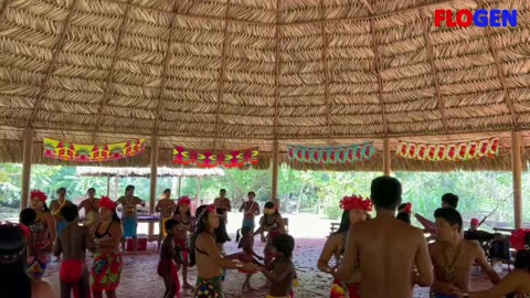 Dancing with Embera Quera indigenous community in Gatun River in Panama