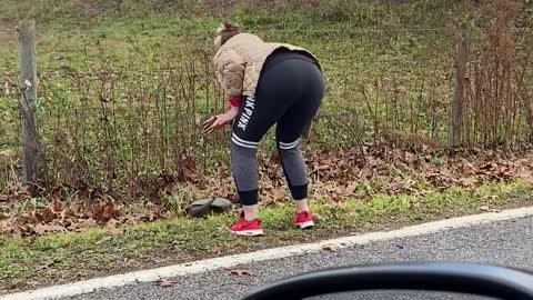 Woman Tries to Help Snapping Turtle off the Road