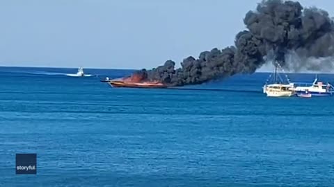 Tourist boat catches fire in Greece