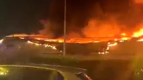 France🚨 Rioters set fire to a large shopping center in a suburb of Paris.