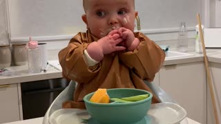 Baby First Time Tasting a Lemon