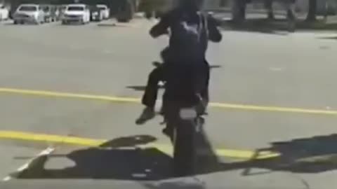 motorbike rider takes off from lights completely out of control