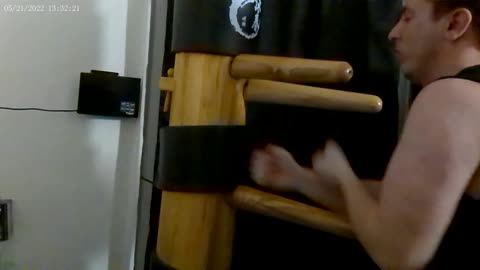 wing chun chain punching on wooden dummy