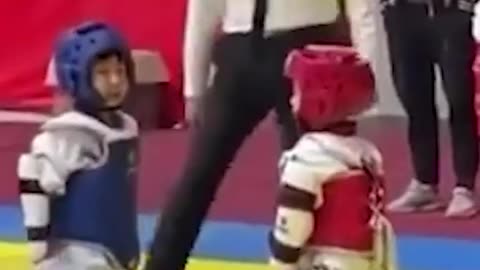 Cute little kids practicing martial arts