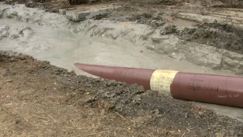 Installing natural gas pipeline across Lake Decatur