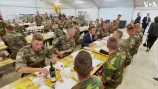 Macron Shares Meal with French, Belgian Troops in Romania