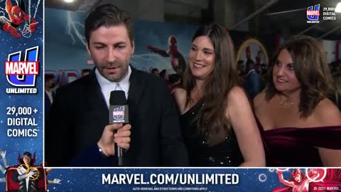 Director Jon Watts is Surrounded By Heroes Spider-Man No Way Home Red Carpet