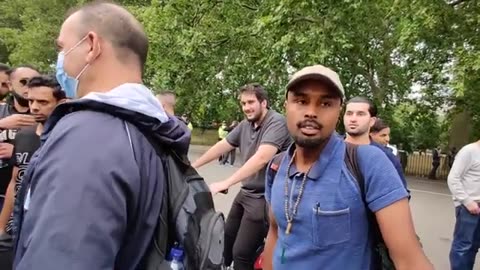 Shamsi runs from Woman at speakers corner also mo deen fights with Oma