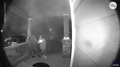 Two people avoid injury by ducking to barely escape a stray firework | USA TODAY
