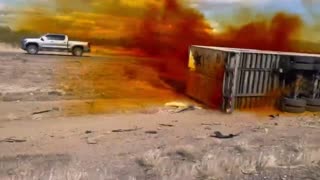 New footage of truck carrying hazardous material overturned on I-10 in Tucson, Arizona