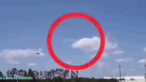 A person captures something invisible bursting out of clouds .