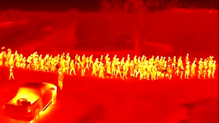 Thermal drone video from our team in Eagle Pass, TX shows a large group of migrants