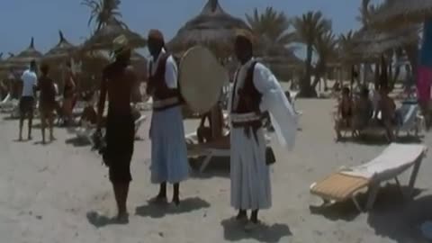 Tunisian horsemen on the beach of Djerba