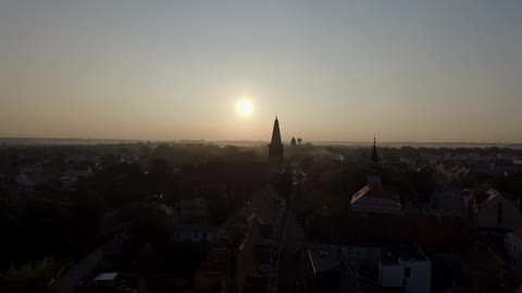 Drone footage of sunrise over Międzyrzecz, Poland