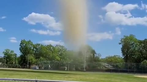 Dust Devil Forms at Playground and Disintegrates as it Flies in the Sky