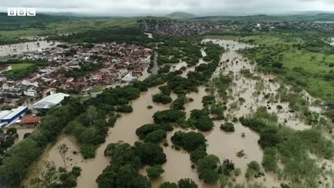 Dams burst in Brazil as deadly flooding continues - BBC News
