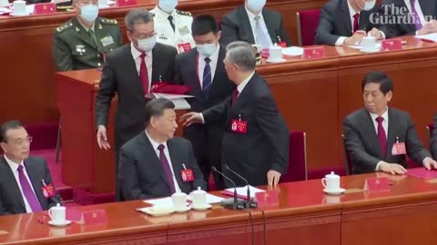 Former Chinese president Hu Jintao unexpectedly led out of party congress (1)
