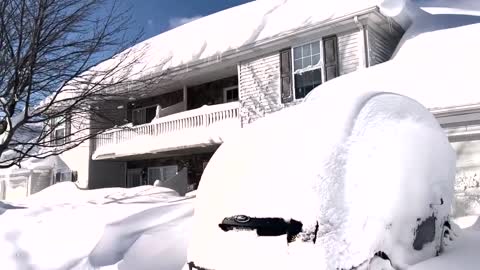 New York state residents dig out after heavy snowstorm