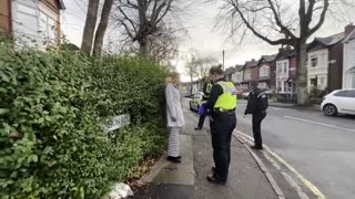 2303. British Police Arrest a Peaceful Woman for Silently Standing on Roadside Near Abortion Center