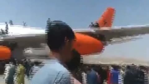 A Kabul resident trying to leave Afghanistan climbed on the wing and fuselage of an Airbus A340