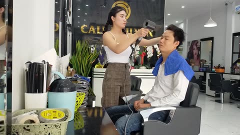 Relaxing shampoo and facial massage service at Vietnamese barbershop