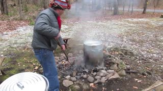 Trash Can Turkey Cooking